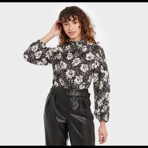 Cascade ruffle balloon sleeve top